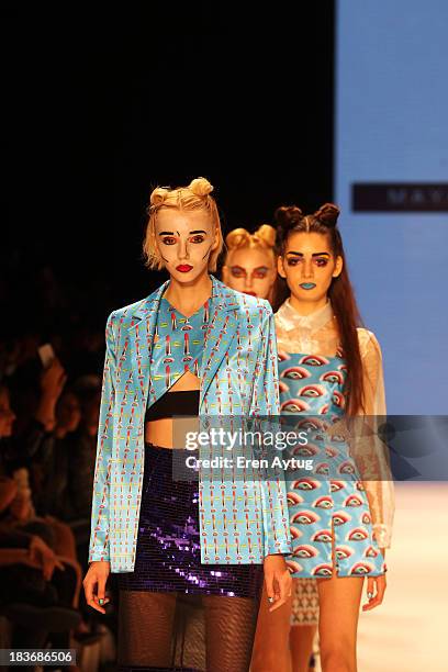 Models walk the runway at the Maybelline New York By DB Berdan show during Mercedes-Benz Fashion Week Istanbul s/s 2014 presented by American Express...