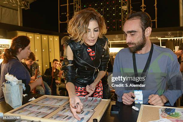 Fashion designer Deniz Berdan is seen backstage at the Maybelline New York By DB Berdan show during Mercedes-Benz Fashion Week Istanbul s/s 2014...
