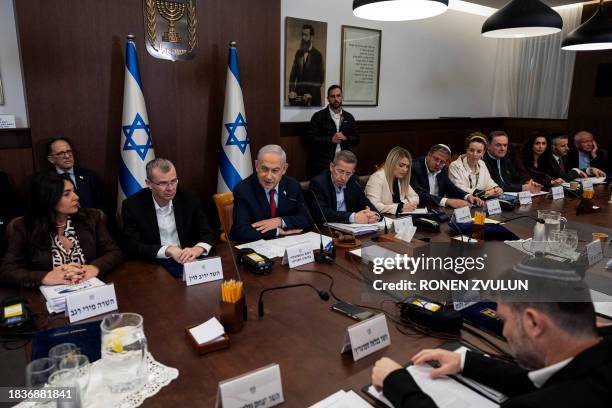 Israeli Prime Minister Benjamin Netanyahu heads the weekly cabinet meeting at his office in Jerusalem on December 10, 2023.