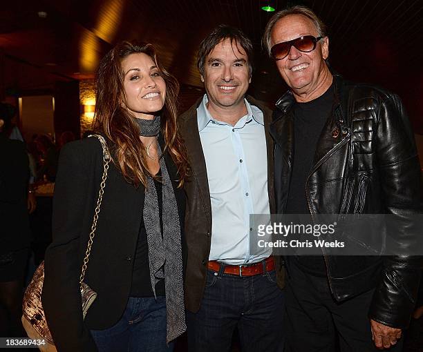 Actress Gina Gerson, director Greg Camalier and actor Peter Fonda attend a special screening of "Muscle Shoals" at the Landmark Theater on October 8,...