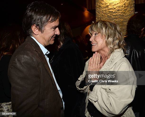 Director Greg Camalier and Tracey Ross attend a special screening of "Muscle Shoals" at the Landmark Theater on October 8, 2013 in Los Angeles,...