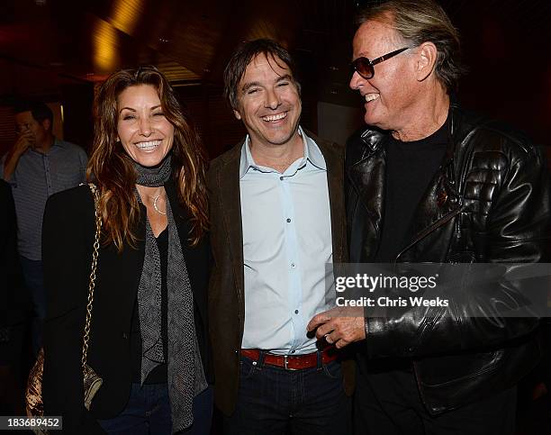 Actress Gina Gerson, director Greg Camalier and actor Peter Fonda attend a special screening of "Muscle Shoals" at the Landmark Theater on October 8,...