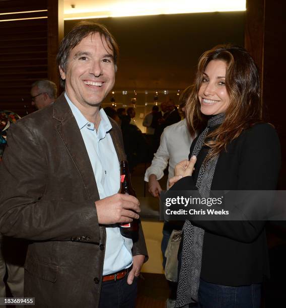 Director Greg Camalier and actress Gina Gerson attend a special screening of "Muscle Shoals" at the Landmark Theater on October 8, 2013 in Los...