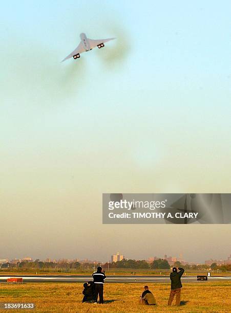 The final British Airways Concorde flight lifts off from John F. Kennedy Airport in New York on its final voyage to London, 24 October 2003. The...