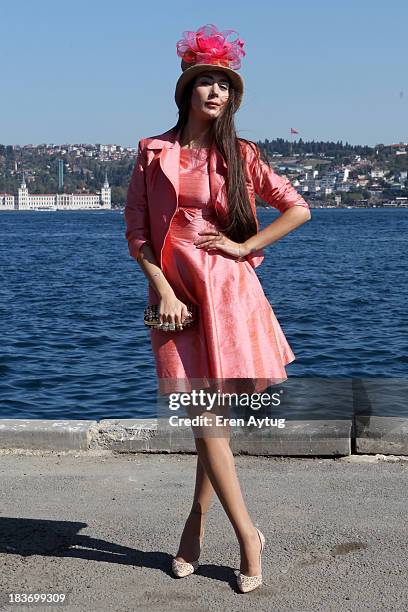 Model Ece Gursel wears Selma State dress, Zara shoes and Alexander Mc Queen bag during Mercedes-Benz Fashion Week Istanbul s/s 2014 presented by...