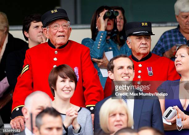 Two Chelsea Pensioners watch the racing as they attend the CAMRA Beer Festival Race Day at Ascot Racecourse on October 5, 2013 in London, England.