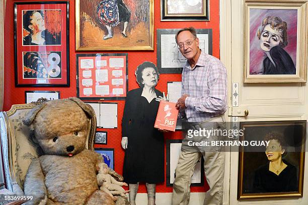 Bernard Marchois, director of Edith Piaf Museum poses in the apartment where late French singer Edith Piaf lived, and now turned into a museum, on...