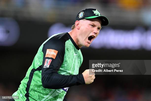 Tom Rogers of the Stars celebrates catching out Usman Khawaja of the Heat during the BBL match between Brisbane Heat and Melbourne Stars at The...