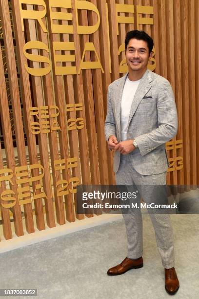 Henry Golding poses for an actor snapshot photocall during the Red Sea International Film Festival 2023 on December 07, 2023 in Jeddah, Saudi Arabia.