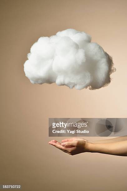 female hand and cloud network - cloud computing stock-fotos und bilder