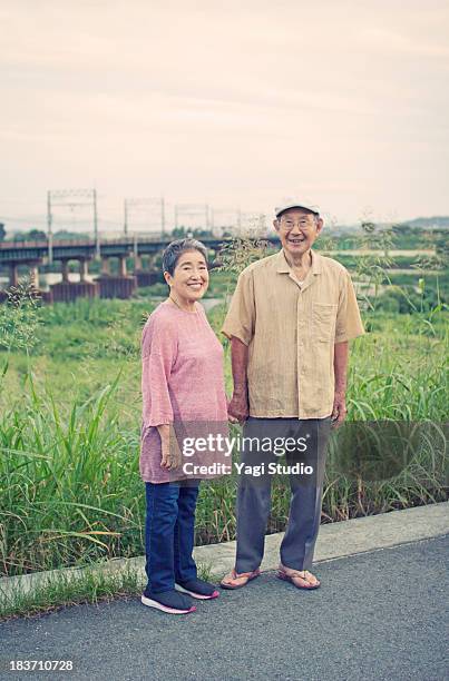 a senior couple in kyoto,japan - front on portrait older full body foto e immagini stock