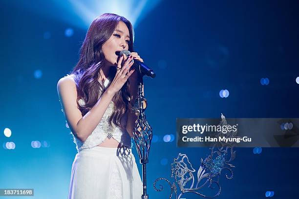 Song Ji-Eun of South Korean girl group Secret performs onstage the MBC Music 'Show Champion' at Uniqlo AX-Hall on October 09, 2013 in Seoul, South...