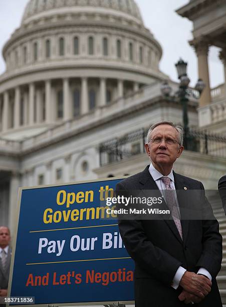 Senate Majority Leader Harry Reid participates in a news conference on the government shutdown at the U.S. Capitol, October 9, 2013 in Washington,...