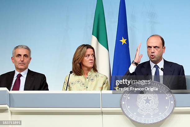 Ministers of the PDL Gaetano Quagliariello, Beatrice Lorenzin and Angelino Alfano attend a press conference at Palazzo Chigi on October 9, 2013 in...