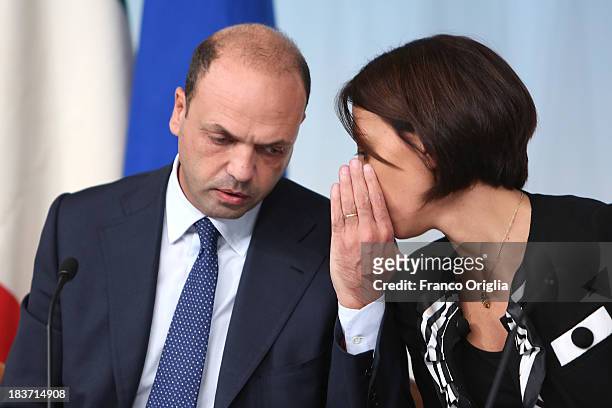 Italy's Agriculture minister Nunzia De Girolamo and deputy Prime Minister and Interior Minister Angelino Alfano of the PDL attend a press conference...