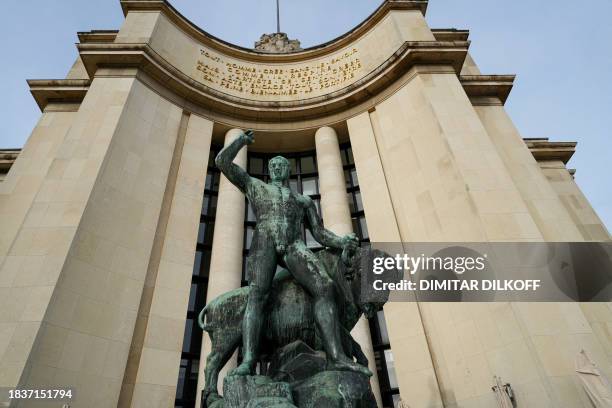 This photograph shows the statue "Hercule" by French sculptor Albert Pommier in front of the "Palais de Chaillot" in Paris, on December 10, 2023. /...