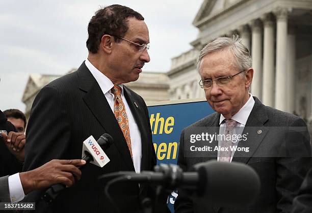 Washington, DC Mayor Vincent Gray comes over from his news conference at the Senate Swamp to confront U.S. Senate Majority Leader Sen. Harry Reid at...