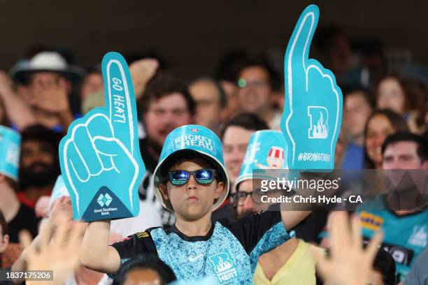 Fans cheer during the BBL match between Brisbane Heat and Melbourne Stars at The Gabba, on December 07 in Brisbane, Australia.