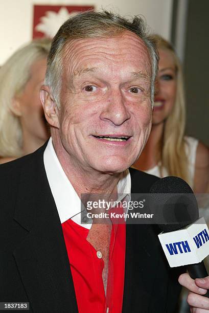 Playboy Hugh Hefner arrives at the grand opening of the club/resturant White Lotus on March 7, 2003 in Hollywood, California.