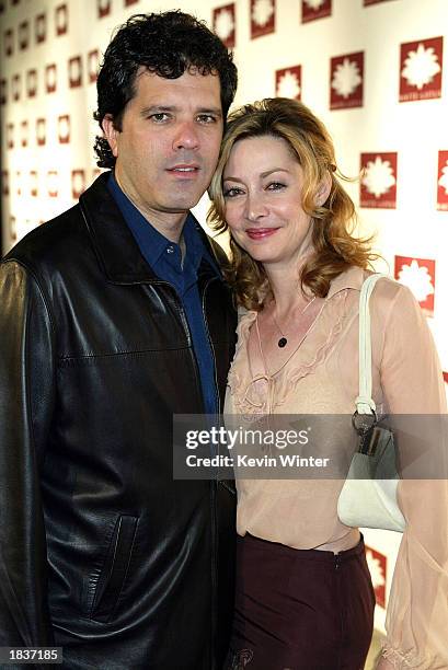 Actress Sharon Lawrence and her boyfriend Tom Apostle arrive at the grand opening of the club/resturant White Lotus on March 7, 2003 in Hollywood,...