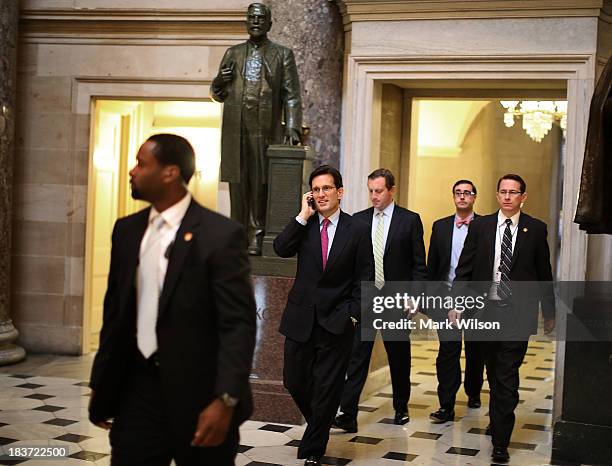 Majority Leader Eric Cantor walks through Statuary Hall at the U.S. Capitol, October 9, 2013 in Washington, DC. The U.S. Government shutdown is...