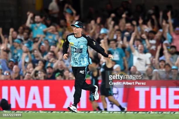 Matt Kuhnemann of the Heat smiles after catching out Glenn Maxwell of the Stars during the BBL match between Brisbane Heat and Melbourne Stars at The...