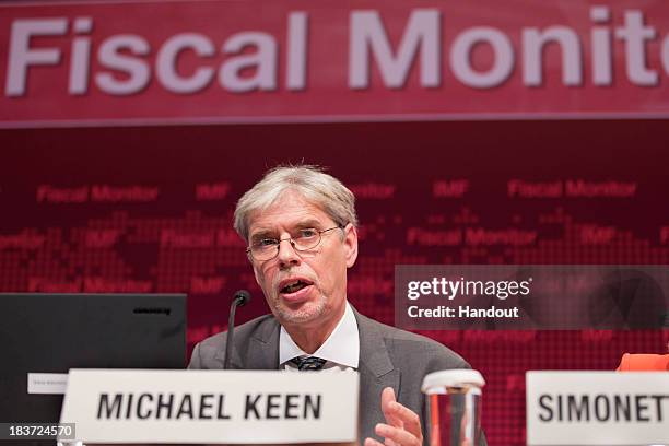 In this handout provided by the International Monetary Fund , International Monetary Fund Deputy Director Michael Keen presents the Fiscal Monitor...