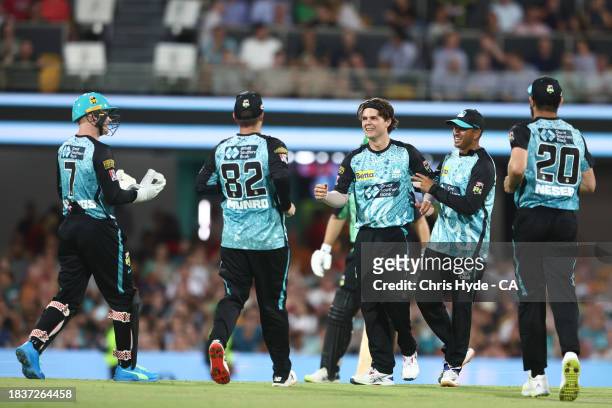 Mitch Swepson of the Heat celebrates after dismissing Joe Burns of the Stars during the BBL match between Brisbane Heat and Melbourne Stars at The...