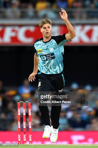 Spencer Johnson of the Heat reacts during the BBL match between Brisbane Heat and Melbourne Stars at The Gabba, on December 07 in Brisbane, Australia.