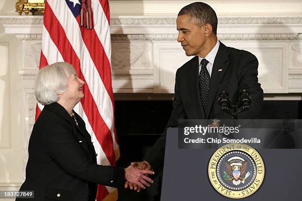 President Barack Obama shakes hands with Janet Yellen during a press conference to nominate her to head the Federal Reserve in the State Dining Room...