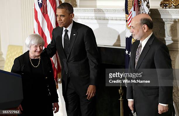President Barack Obama escorts Janet Yellen , his nominee to be the next Chairman of the Federal Reserve, with current Chairman of the Federal...