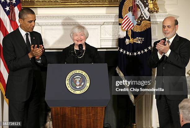 Janet Yellen recieves applause from U.S. President Barack Obama and current Chairman of the Federal Reserve Ben Bernake during a press conference to...