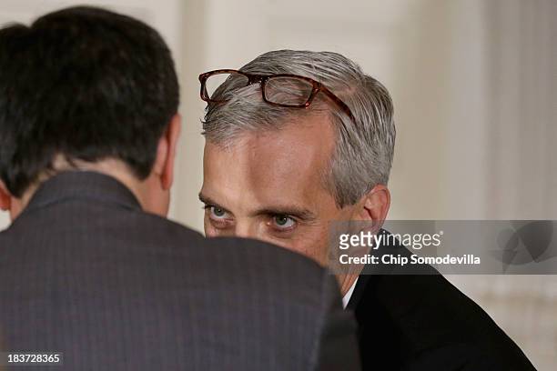 White House Chief of Staff Denis McDonough talks with Treasury Secretary Jack Lew before U.S. President Barack Obama announced his nomination of...