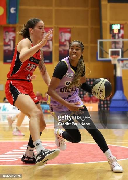 Jordin Canada of the Boomers drives to the basket during the WNBL match between Perth Lynx and Melbourne Boomers at Bendat Basketball Stadium, on...