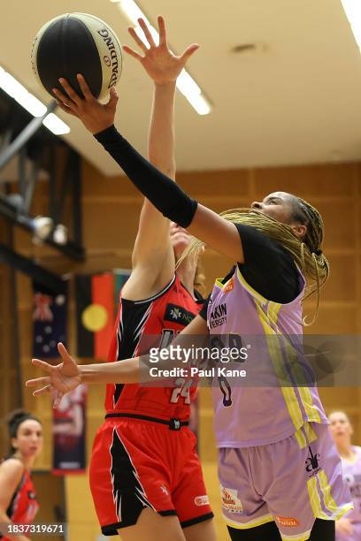 Jordin Canada of the Boomers goes to the basket during the WNBL match between Perth Lynx and Melbourne Boomers at Bendat Basketball Stadium, on...