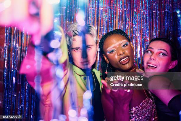 diverse group of lgbtqia friends celebrating at a party - gay man dancing stock pictures, royalty-free photos & images