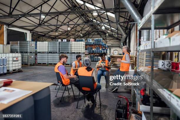 team collaboration in the factory - hexham stock pictures, royalty-free photos & images