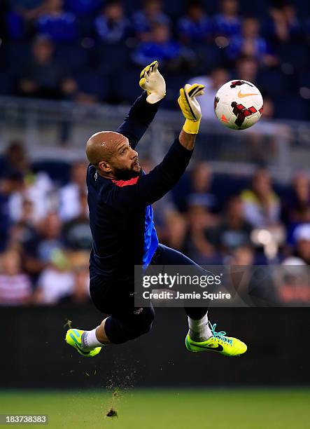 Goalkeeper Tim Howard makes a save during a training session for the US Men's National Soccer Team in advance of their game vs Jamaica at Sporting...