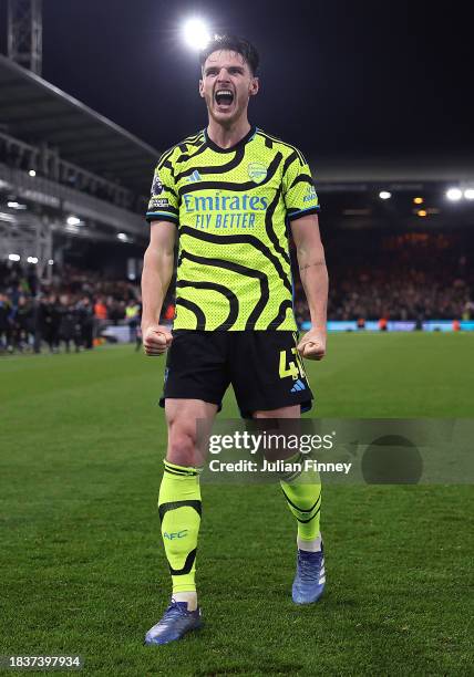 Declan Rice of Arsenal celebrates after scoring the team's fourth goal to make it 4-3 during the Premier League match between Luton Town and Arsenal...