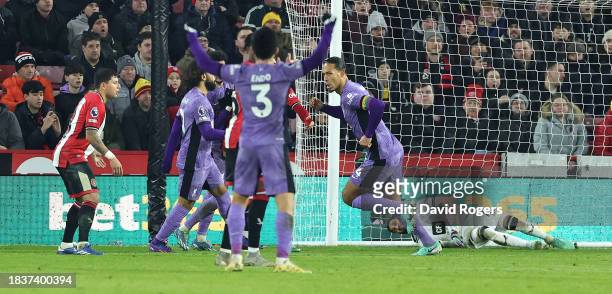 Virgil van Dijk of Liverpool celebrates after scoring their first goal during the Premier League match between Sheffield United and Liverpool FC at...