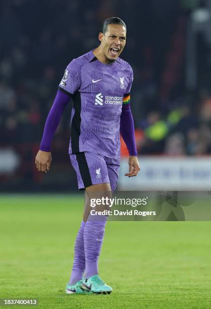 Virgil van Dijk of Liverpool celebrates after scoring their first goal during the Premier League match between Sheffield United and Liverpool FC at...