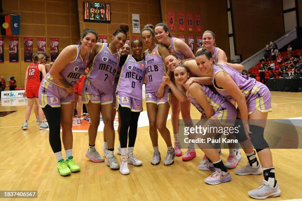 The Boomers pose for team photo after winning the WNBL match between Perth Lynx and Melbourne Boomers at Bendat Basketball Stadium, on December 07 in...