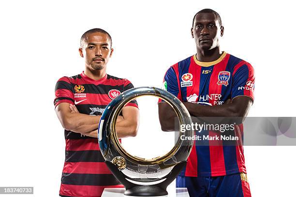 Shinji Ono of the Western Sydney Wanders and Emile Heskey of Newcastle Jets pose during the 2013/14 A-League Season Launch at Allianz Stadium on...