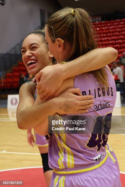 Tera Reed and Sara Blicavs of the Boomers celebrate winning the WNBL match between Perth Lynx and Melbourne Boomers at Bendat Basketball Stadium, on...
