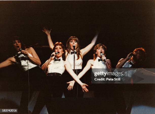 Anne Nolan, Coleen Nolan, Linda Nolan, Bernie Nolan and Maureen Nolan of The Nolans perform on stage at the Dominion Theatre, on November 30th, 1982...