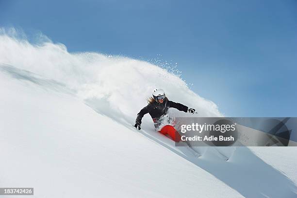 woman skiing - powder snow fotografías e imágenes de stock