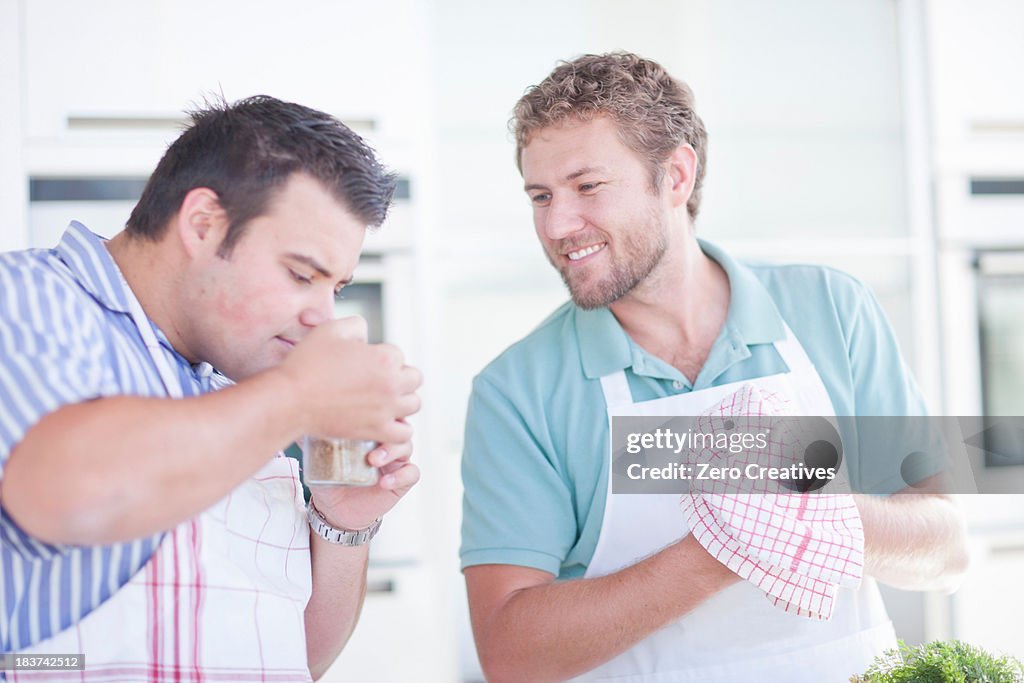 Young man smelling ingredients