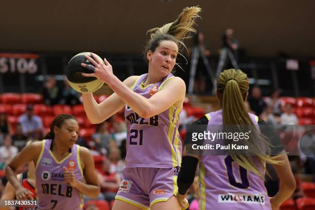 Keely Froling of the Boomers rebounds during the WNBL match between Perth Lynx and Melbourne Boomers at Bendat Basketball Stadium, on December 07 in...