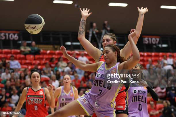 Naz Hillmon of the Boomers and Emily Potter of the Lynx contest for a rebound during the WNBL match between Perth Lynx and Melbourne Boomers at...