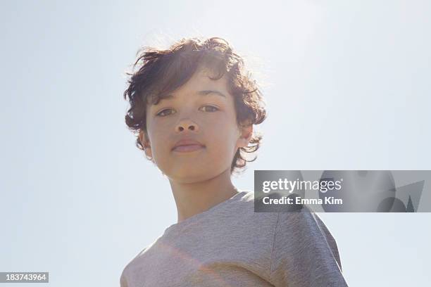 boy looking down at camera - kid looking down stock pictures, royalty-free photos & images